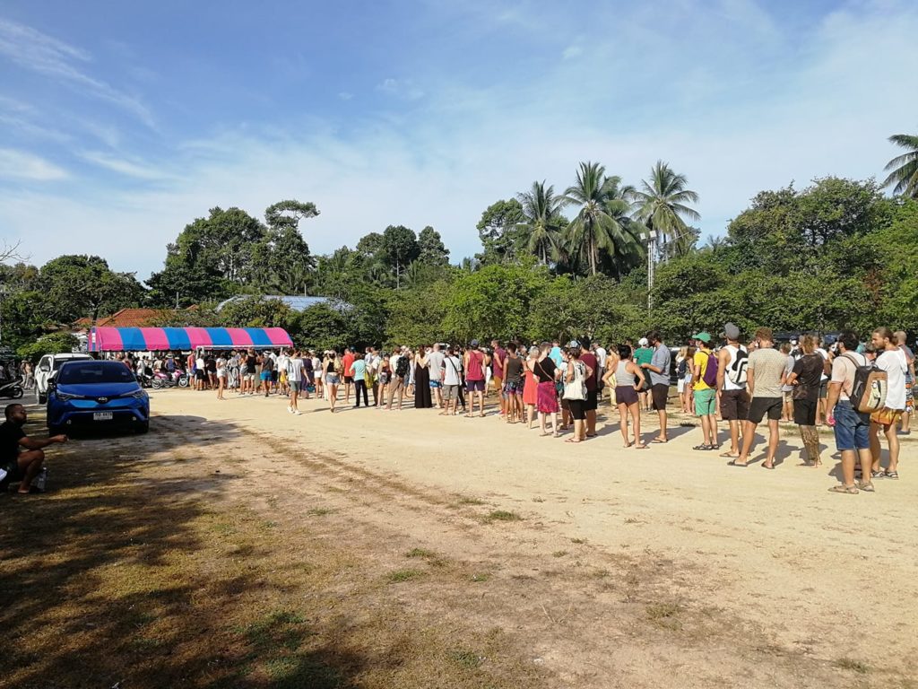 foreigners lining up in koh phangan for visa extension
